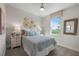 Bright bedroom featuring neutral walls, carpet, and an abundance of natural light from the lovely window view at 44240 Creekside Run Ln, Punta Gorda, FL 33982