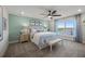 Bright bedroom with a serene view, neutral tones, and decorative accents creating a relaxing and inviting atmosphere at 44240 Creekside Run Ln, Punta Gorda, FL 33982