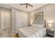 This delightful bedroom showcases a neutral palette, wood-look flooring, and a well-lit ambiance at 4717 Zeno Ct, Bradenton, FL 34211