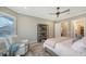 Relax in this bedroom with natural light, a cozy chair, and calming decor, creating a peaceful retreat at 4717 Zeno Ct, Bradenton, FL 34211