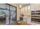 Gourmet kitchen with stainless steel grill and view of screened patio dining at 4717 Zeno Ct, Bradenton, FL 34211