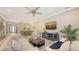 Open floorplan showing living room, dining area, and seamless flow, enhancing spaciousness at 4717 Zeno Ct, Bradenton, FL 34211