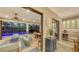 Enjoy seamless indoor-outdoor living with an open layout and view of the screened-in pool and patio at 4717 Zeno Ct, Bradenton, FL 34211
