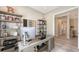 Well-appointed study features shelving, natural light, modern desk setup, and convenient access to the main house at 4717 Zeno Ct, Bradenton, FL 34211
