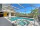 The covered and screened pool also offers a connected hot tub at 4745 Antler Trl Trl, Sarasota, FL 34238