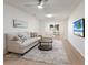 Comfortable living room with plush seating and a ceiling fan, creates a cozy atmosphere for relaxation at 5011 Live Oak Cir # 65, Bradenton, FL 34207