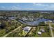 Amazing home on a waterfront canal features a private pool, lush landscaping, and fantastic views of the water at 503 1St Nw Ave, Ruskin, FL 33570