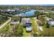 Beautiful waterfront home with private pool and canal access, surrounded by lush greenery at 503 1St Nw Ave, Ruskin, FL 33570