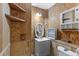 Rustic bathroom with wood paneling, white vanity, and woven accents at 503 1St Nw Ave, Ruskin, FL 33570
