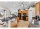 Spacious kitchen featuring granite countertops, wood cabinets, and modern appliances at 503 1St Nw Ave, Ruskin, FL 33570
