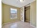 Bedroom featuring a window for natural light and a closet at 5061 Placida Rd # A, Englewood, FL 34224