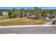 Cleared lot ready for your dream home with mature trees and wood and chain link fencing at 5061 Placida Rd # A, Englewood, FL 34224