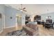 Open-concept living area with modern kitchen, dining space, and lots of natural light at 5068 Inshore Landing Dr, Apollo Beach, FL 33572