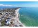 Expansive aerial view of beachfront homes and the coastline of Longboat Key at 552 Juan Anasco Drive, Longboat Key, FL 34228