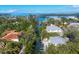 Experience waterfront living with private docks and serene canal views on Longboat Key at 552 Juan Anasco Drive, Longboat Key, FL 34228
