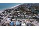Overhead view capturing the coastal neighborhood with homes along canals, providing direct access to the ocean at 552 Juan Anasco Drive, Longboat Key, FL 34228