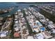 Discover this waterfront property from above, nestled in a coastal neighborhood with convenient canal access to open waters at 552 Juan Anasco Drive, Longboat Key, FL 34228