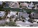 Aerial shot of waterfront homes with boat docks on canals, offering convenient access to the open water at 552 Juan Anasco Drive, Longboat Key, FL 34228