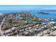 Expansive aerial view showcasing beautiful homes on waterfront property, with stunning views of the bay at 552 Juan Anasco Drive, Longboat Key, FL 34228