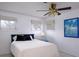 This cozy bedroom is well-lit with natural light coming through the windows at 552 Juan Anasco Drive, Longboat Key, FL 34228