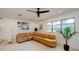 Spacious living room featuring modern lighting, neutral walls, and large window for natural light at 552 Juan Anasco Drive, Longboat Key, FL 34228