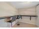 Cozy dining area features a custom bar and seating, with modern lighting at 5601 Bentgrass Dr # 10-115, Sarasota, FL 34235