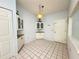 Cozy dining area features neutral paint and tile flooring at 5638 Garden Lakes Palm, Bradenton, FL 34203