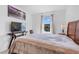 Bright bedroom featuring a large window for ample natural light at 5734 Archipelago St, Nokomis, FL 34275
