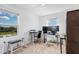 Home office features bright natural light and ample room for multiple computer monitors at 5734 Archipelago St, Nokomis, FL 34275