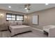 A tranquil bedroom with ample natural light, neutral tones, and a comfortable layout at 5757 Gulf Of Mexico Dr # 110, Longboat Key, FL 34228