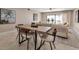 This home features a lovely dining room with beach views, perfect for enjoying meals with Gathering and friends at 5757 Gulf Of Mexico Dr # 110, Longboat Key, FL 34228