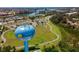Aerial shot of community water tower, parks, and recreational areas near the scenic waterway at 618 Bird Bay S Dr # 118, Venice, FL 34285