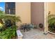 Exterior view of community bike racks in a courtyard area surrounded by landscaping at 618 Bird Bay S Dr # 118, Venice, FL 34285