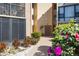 Exterior of a condo building shows manicured landscaping and easy access to parking, and shows building entrance at 618 Bird Bay S Dr # 118, Venice, FL 34285