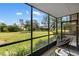 Enjoy the outdoors from this screened porch with a scenic view and comfortable seating at 618 Bird Bay S Dr # 118, Venice, FL 34285