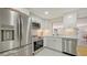 Modern kitchen with stainless steel appliances and ample cabinet space at 618 Buttonwood Dr, Longboat Key, FL 34228