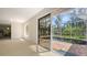 Screened-in pool area featuring brick patio and a view of the lush landscaping at 618 Buttonwood Dr, Longboat Key, FL 34228