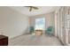 Sunlit sitting area with tiled floors, sheer curtains, and french doors at 618 Buttonwood Dr, Longboat Key, FL 34228