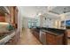 Spacious kitchen featuring custom cabinets, stainless steel appliances, and a large kitchen island at 7157 Saddle Creek Cir, Sarasota, FL 34241