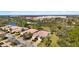 Desirable villa boasts mature landscaping, screened in lanai and lovely community views at 7623 Camminare Dr, Sarasota, FL 34238