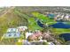 Stunning aerial view showcasing the community amenities, including a golf course, tennis courts, and pool at 8536 54Th Avenue E Cir, Bradenton, FL 34211