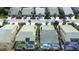 Community aerial view featuring lush greenery, pools, green roofs and orderly street layout at 8536 54Th Avenue E Cir, Bradenton, FL 34211