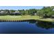 Picturesque golf course view featuring a serene lake and lush green fairways at 8536 54Th Avenue E Cir, Bradenton, FL 34211