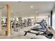 Bright gym featuring modern exercise machines, treadmills, and weightlifting equipment at 8536 54Th Avenue E Cir, Bradenton, FL 34211
