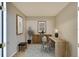 Home office featuring a light wood desk and earth-toned accents and decor at 8536 54Th Avenue E Cir, Bradenton, FL 34211