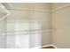 Walk-in closet with wire shelving for ample storage and organization at 8536 54Th Avenue E Cir, Bradenton, FL 34211