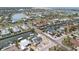 Waterfront community featuring canals, colorful homes, and easy access to the Gulf, showcasing Florida living at 928 Spindle Palm Way, Apollo Beach, FL 33572