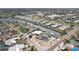 A vibrant waterfront community with canals, colorful homes, and convenient access to open water at 928 Spindle Palm Way, Apollo Beach, FL 33572