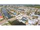 Waterfront home with boat dock offers canal access and proximity to amenities at 928 Spindle Palm Way, Apollo Beach, FL 33572