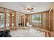 Unfinished bathroom area with cinder block walls, toilet, and wooden frame at 928 Spindle Palm Way, Apollo Beach, FL 33572